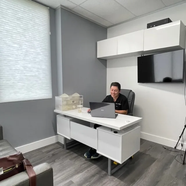 Dr. Levesque in consultation — Levesque Plastic Surgery Austin TX